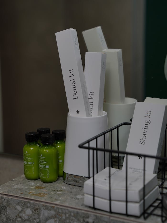 The Art of Drawing Readers In: Your attractive post title goes here Close-up of hotel toiletries including dental and shaving kits on countertop.